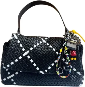 Artisan Weave-The Art of Handwoven Elegance — a handmade leather bag