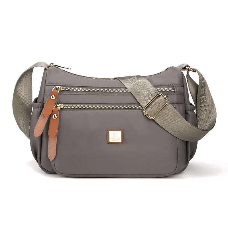Multi-compartment shoulder bag